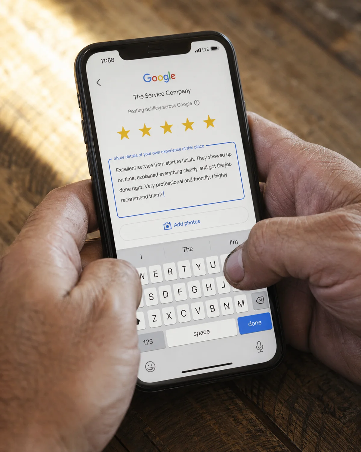 Customer typing a 5-star Google review Excellent service from start to finish visible on screen